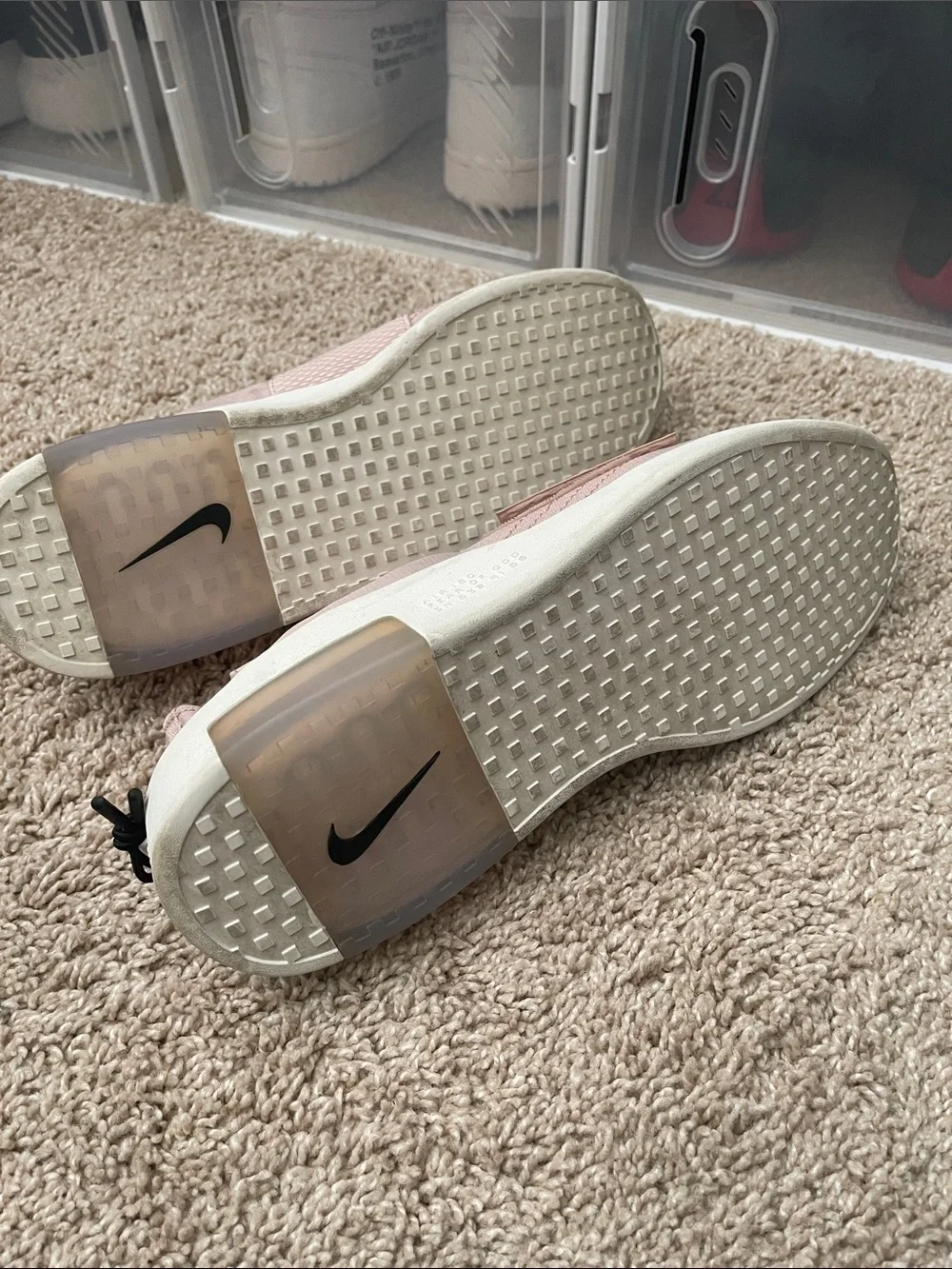 Nike Light Pink Slip-On Sneakers with Black Swoosh